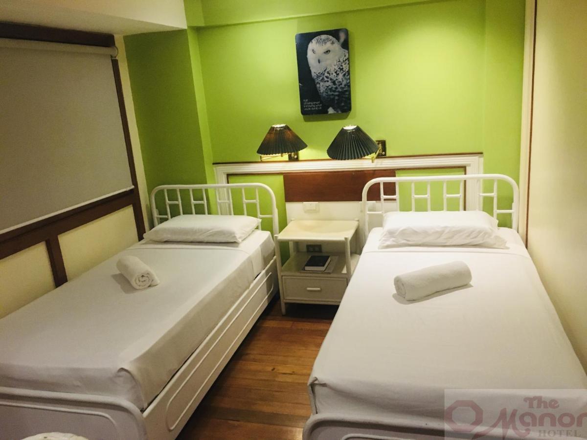 The Manor Hotel Davao Bagian luar foto