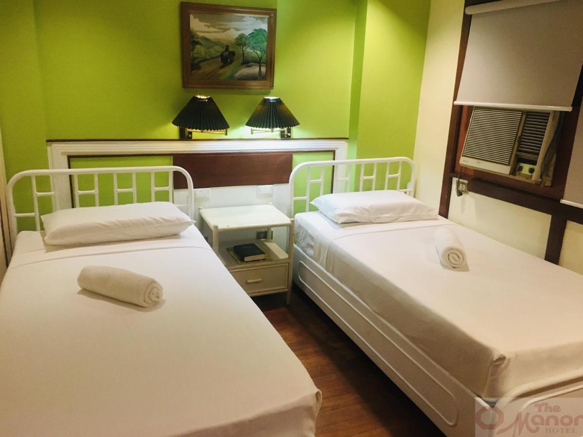 The Manor Hotel Davao Bagian luar foto