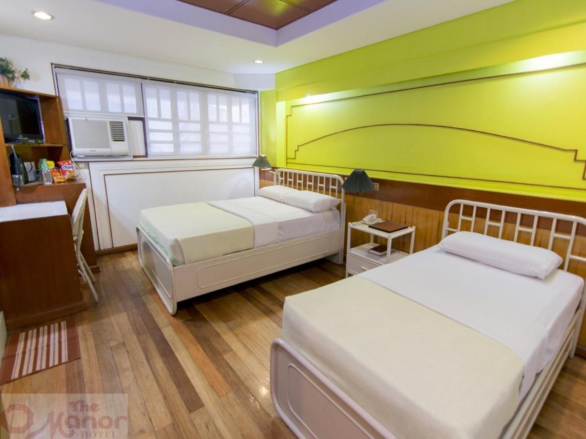 The Manor Hotel Davao Bagian luar foto