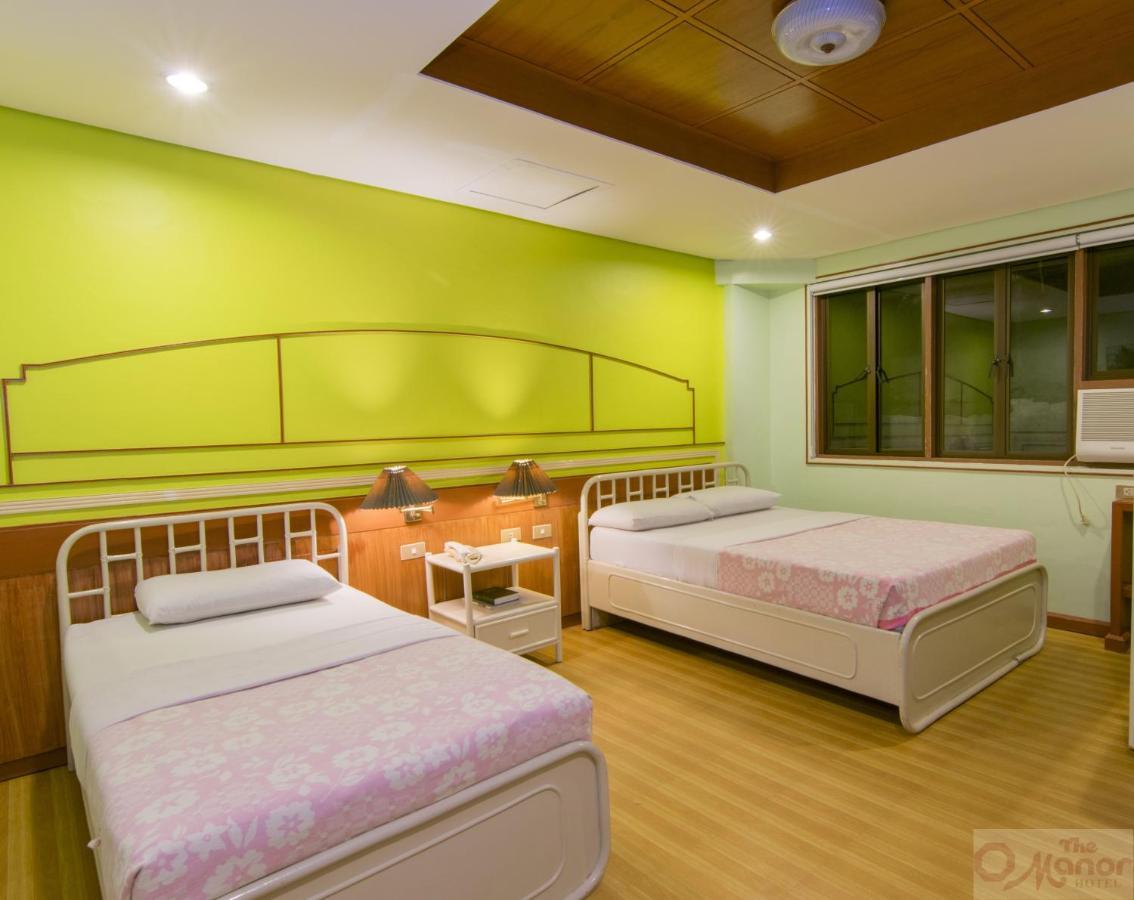 The Manor Hotel Davao Bagian luar foto