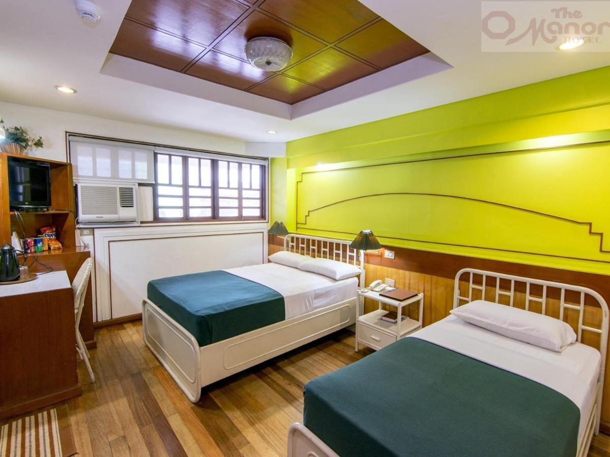The Manor Hotel Davao Bagian luar foto