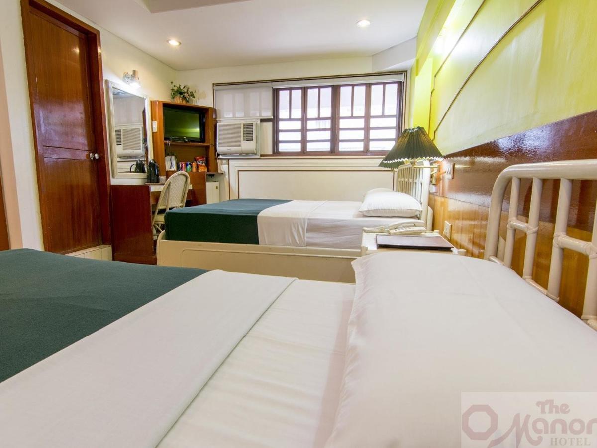 The Manor Hotel Davao Bagian luar foto
