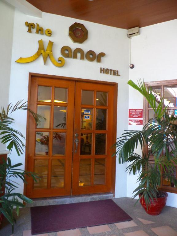 The Manor Hotel Davao Bagian luar foto